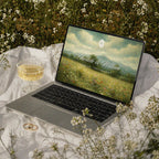 Twilight Meadow Canva wedding website template on laptop, moody oil painting landscape homepage, cinematic and romantic wedding website template
